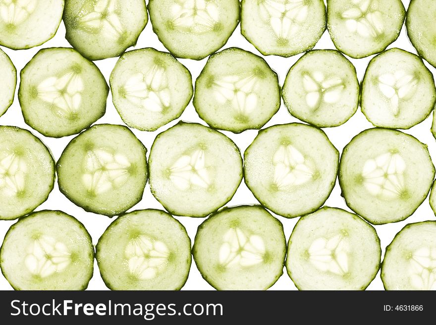 Pattern of cucumber slices isolated on white