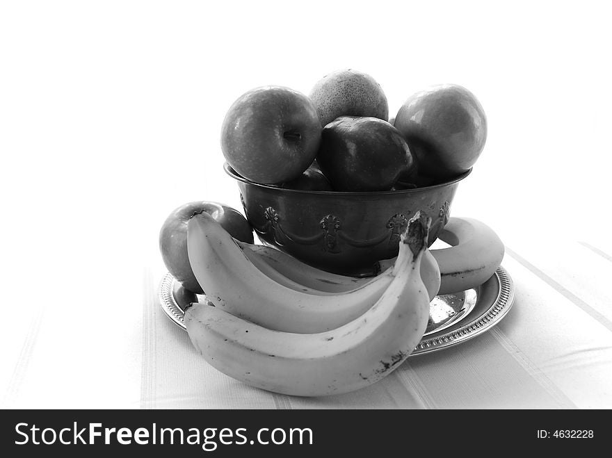 Black and white image of a fresh bowl of fruit. Black and white image of a fresh bowl of fruit