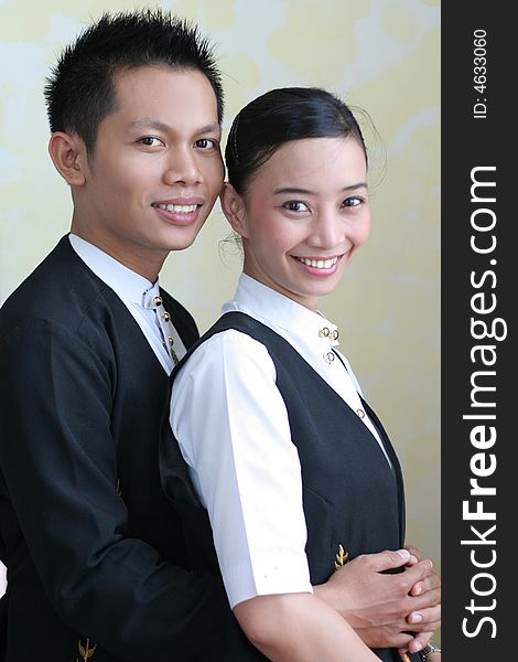 Photograph of two restaurant staff. Photograph of two restaurant staff