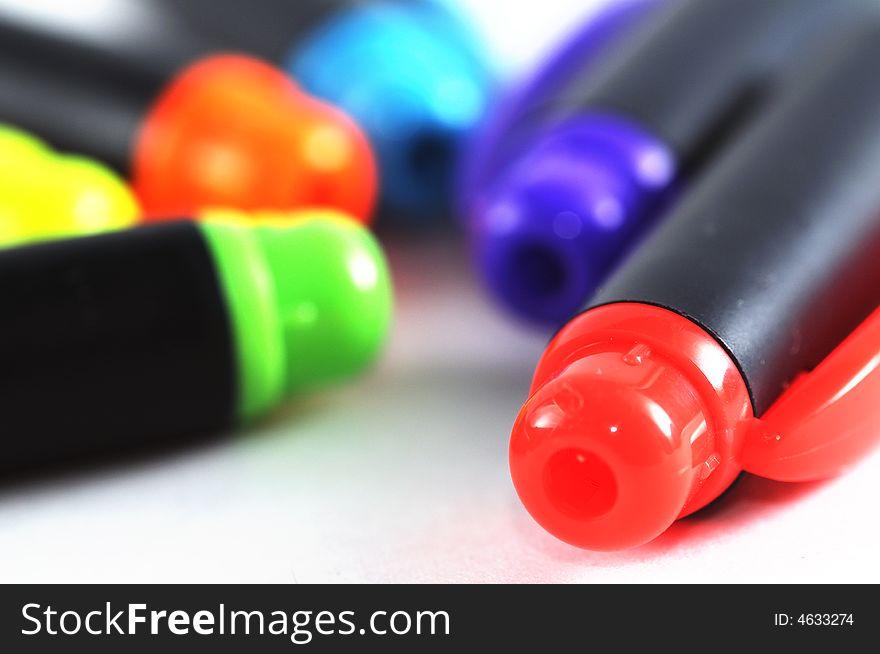 A variety of random coloured pens. A variety of random coloured pens