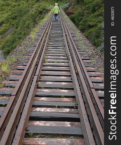 People walking on railtrack in north western Argentina