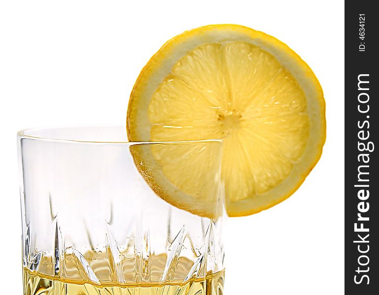 Lemon slice on the glass with lemonade