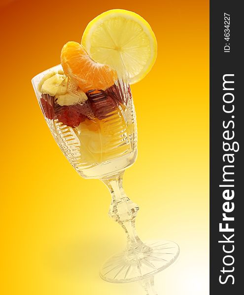 Fruits salad in the cup isolated