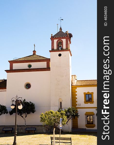 Located near Rosal de la Frontera, Andaluc�(Spain) is this church and bell tower located in a city center plaza. Located near Rosal de la Frontera, Andaluc�(Spain) is this church and bell tower located in a city center plaza.