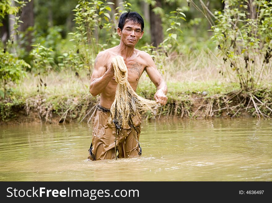 Fishing with a throw net