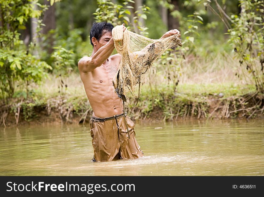 Fishing with a throw net