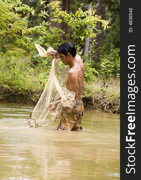 Fishing With A Throw Net