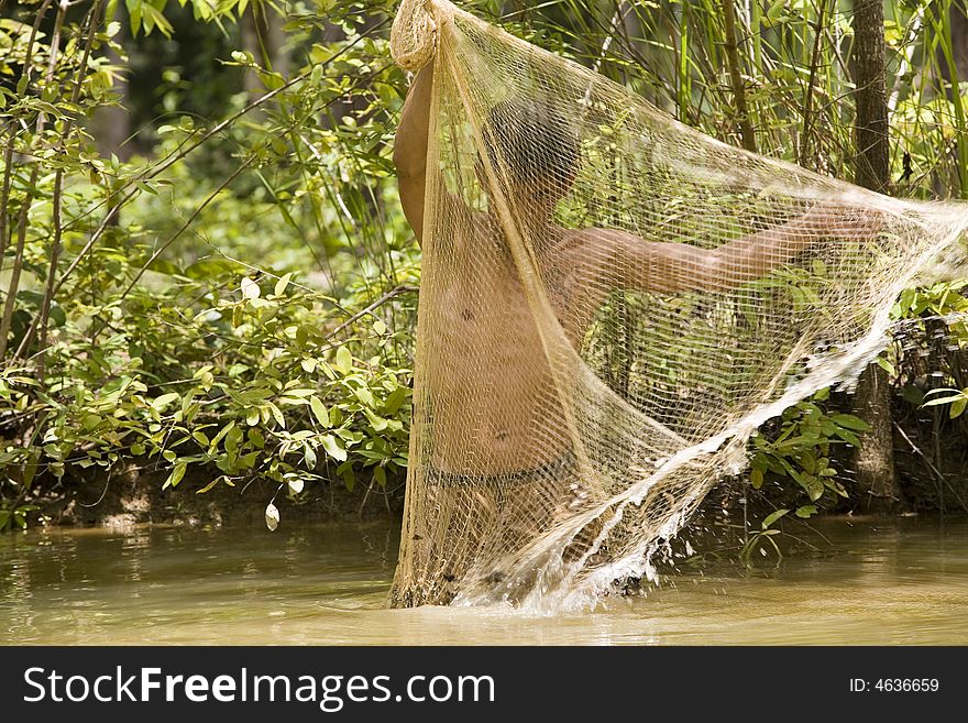 Fishing with a throw net