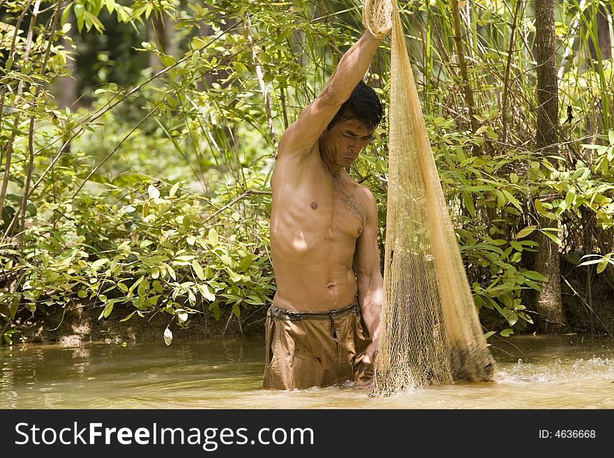 Fishing With A Throw Net