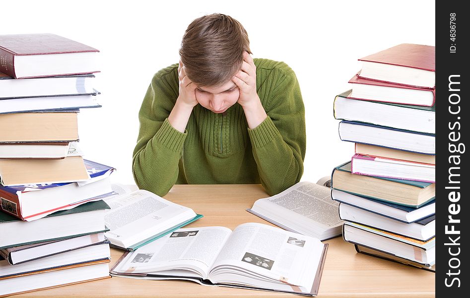 The young student with books isolated on a white background