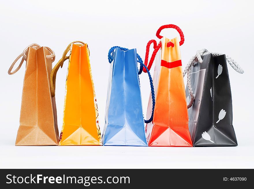 Christmas colorful paper bags isolated on white