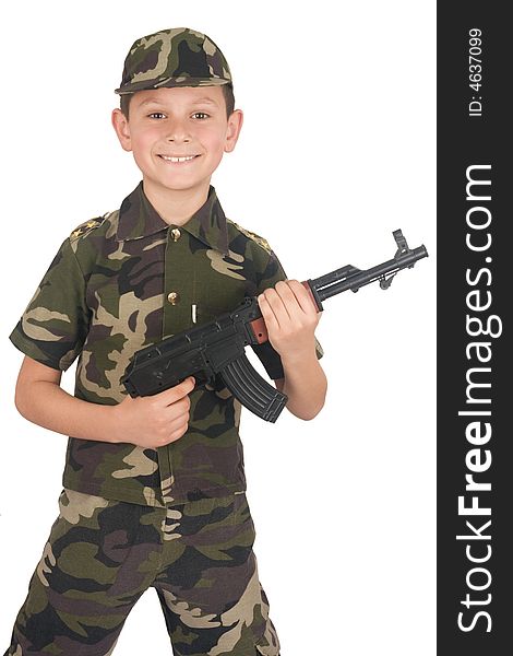Young boy hold gun isolated on white background