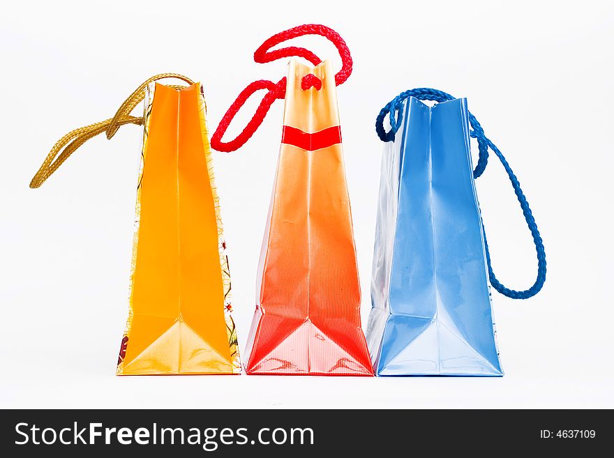 Christmas colorful paper bags isolated on white