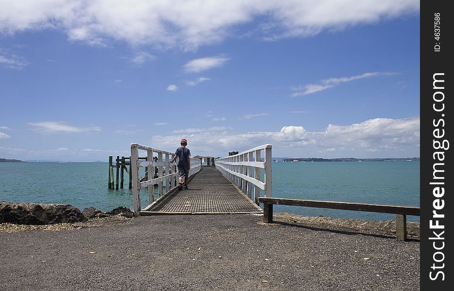 Child on ferry wharf on Rangitoto Island, New Zealand. Child on ferry wharf on Rangitoto Island, New Zealand