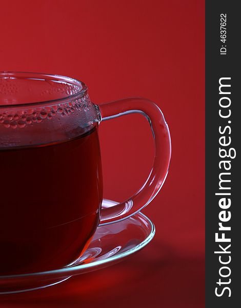 Cup of tea on a red