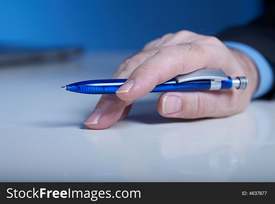 Businessman's hand with pan. Businessman's hand with pan