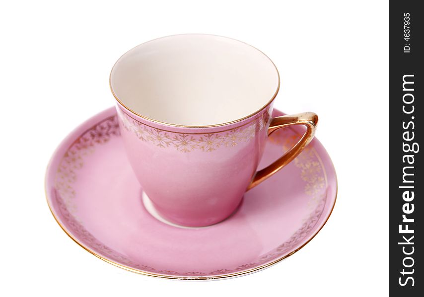 Pink tea-cup isolated on white background