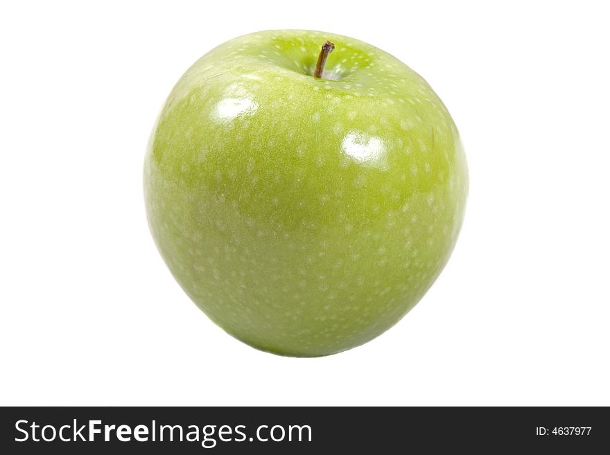 A fresh green granny smith apple on a white background. A fresh green granny smith apple on a white background