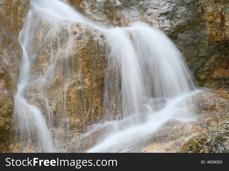 A beautiful waterfall is in the Crimean mountains