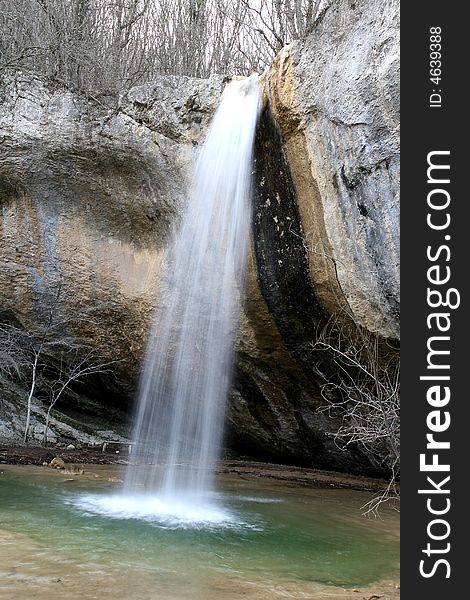 A beautiful waterfall is in the Crimean mountains