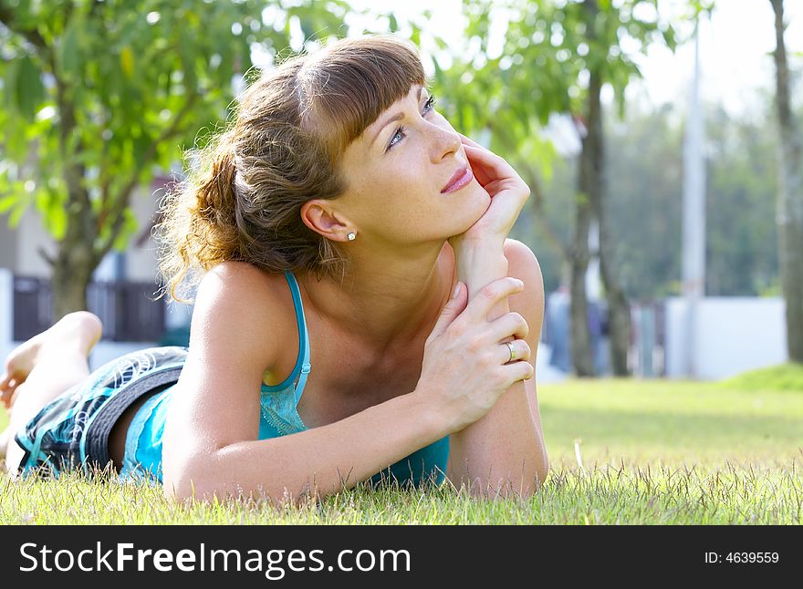 Portrait of young beautiful woman  in summer environment. Portrait of young beautiful woman  in summer environment