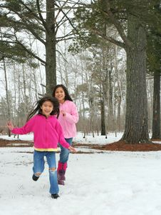 Two Girls Running Through The Snow Stock Photography Two Girls Running Through The Snow Stock Photography