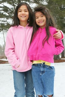 Two Girls Enjoying The Winter Royalty Free Stock Photos Two Girls Enjoying The Winter Royalty Free Stock Photos