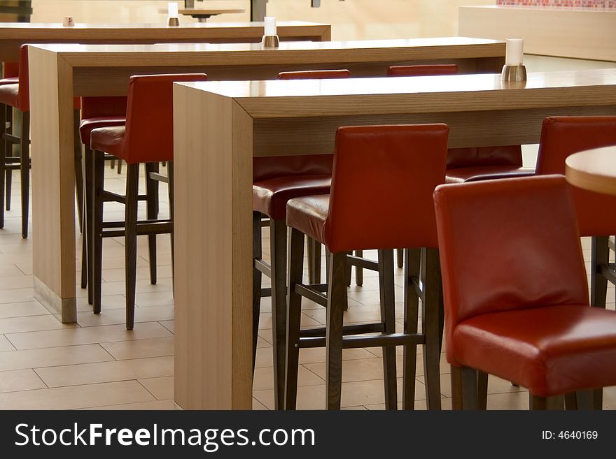 Chairs and tables at small cafe