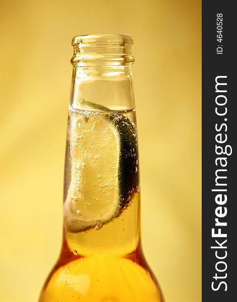 Mexican beer bottle with slice of lime. Mexican beer bottle with slice of lime