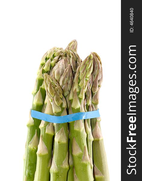 Asparagus spear tops isolated against white background. Asparagus spear tops isolated against white background