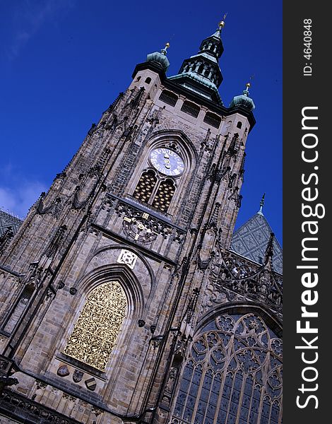 St. Vitus cathedral gothic tower in Prague Castle area. St. Vitus cathedral gothic tower in Prague Castle area