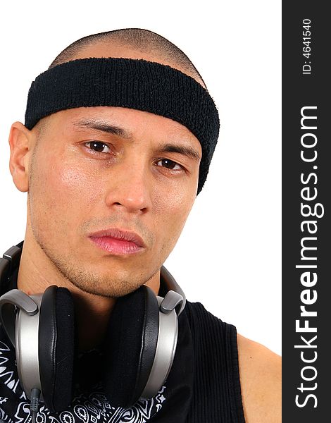 A young DJ with headphones in black. A young DJ with headphones in black.