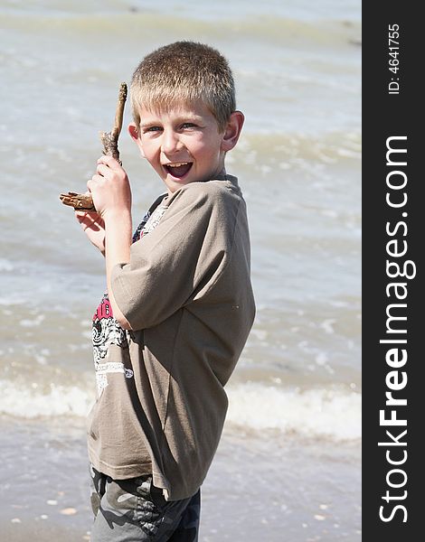Male child haveing fun at the beach. Male child haveing fun at the beach