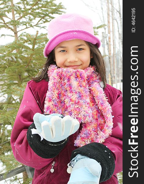 Nine year old girl enjoying winter outdoors. Nine year old girl enjoying winter outdoors