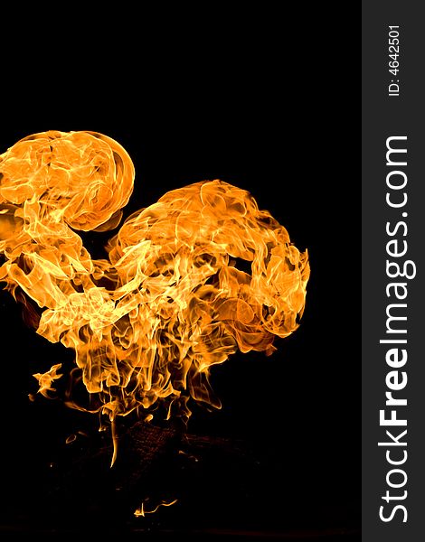 Fire series: high flame over dark background. Fire series: high flame over dark background