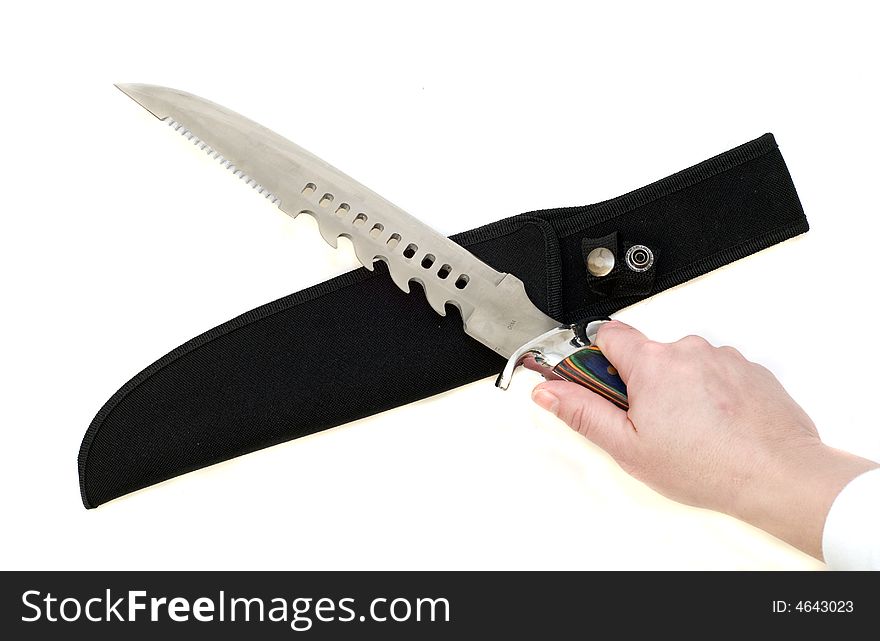 Isolated large hunting knife with serrated edge