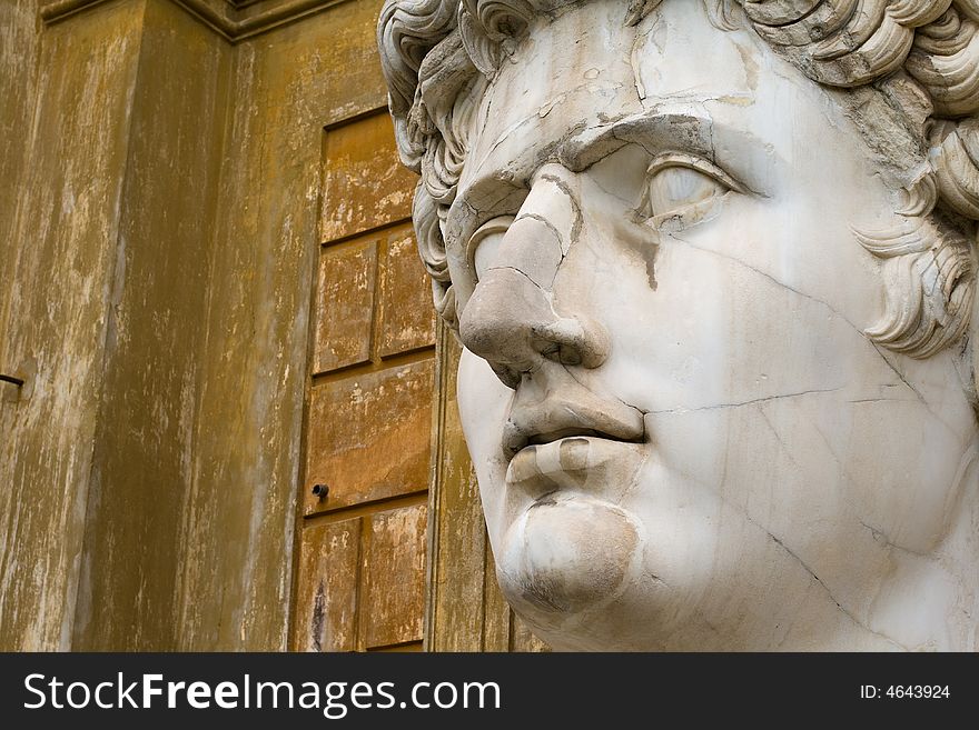 Close-up on the head of a very large statue of Roman emperor Augustus. Close-up on the head of a very large statue of Roman emperor Augustus