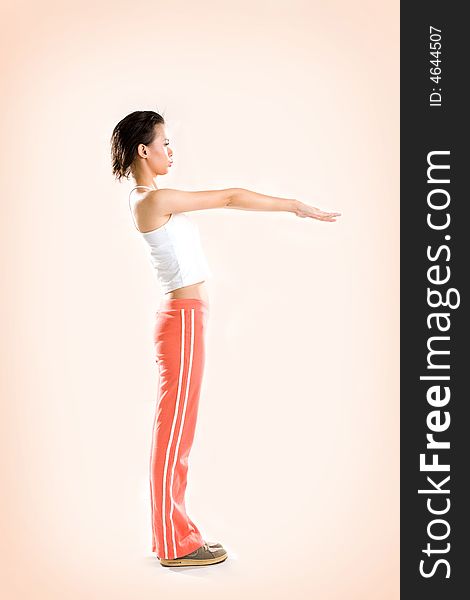 Woman doing warm up before exercise by stretching hands