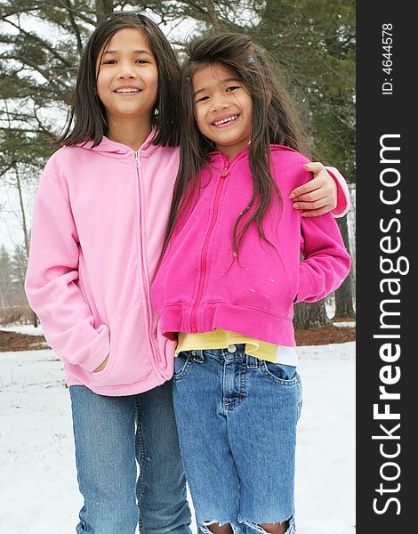 Two girls enjoying the winter