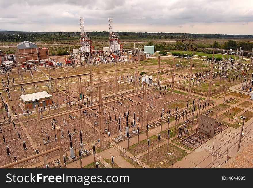 Three gas turbines with their associated transformers station. Three gas turbines with their associated transformers station