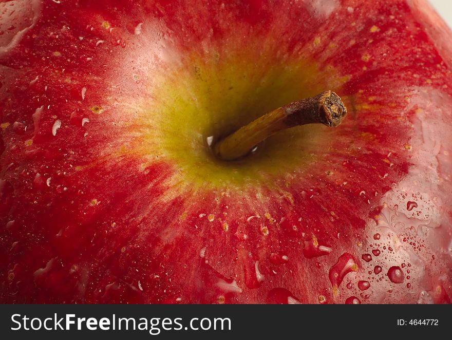 Close Up Red Apple With Water Droplets