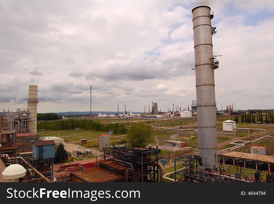 A view of a petrol refinery taken from the roof of a close power plant