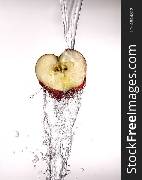 Water Pouring Off Red Apple.