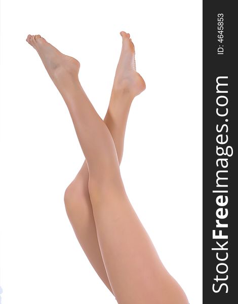 Woman legs on isolated background