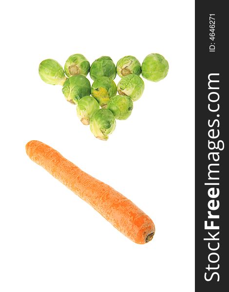 Carrot and brussels sprouts pretending snooker balls and stick. Carrot and brussels sprouts pretending snooker balls and stick