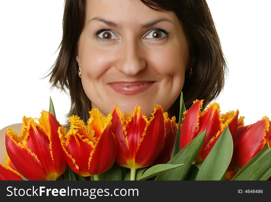 Portrait of a beautiful woman with tulips