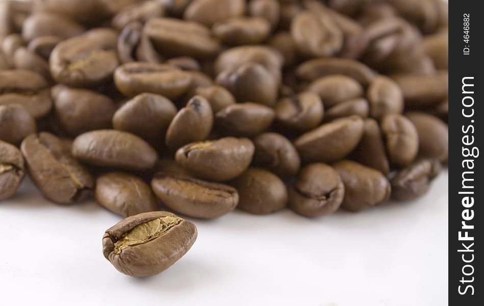 Some coffee seeds against a white background