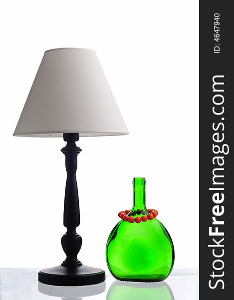 Green Bottle And White Lamp