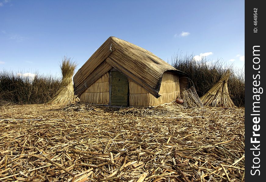 A reed house on the floating islands of Uros. A reed house on the floating islands of Uros.