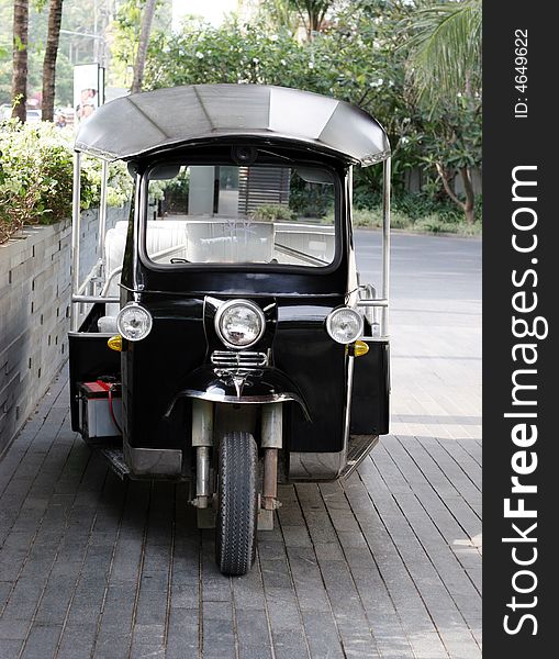 A Thai taxi (tuk tuk) - travel and tourism.